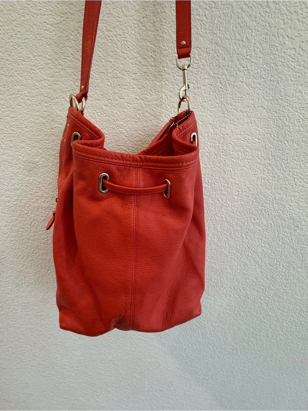Coach Twist Lock Coral-Orange Pebbled Leather Drawstring Shoulder Bag
